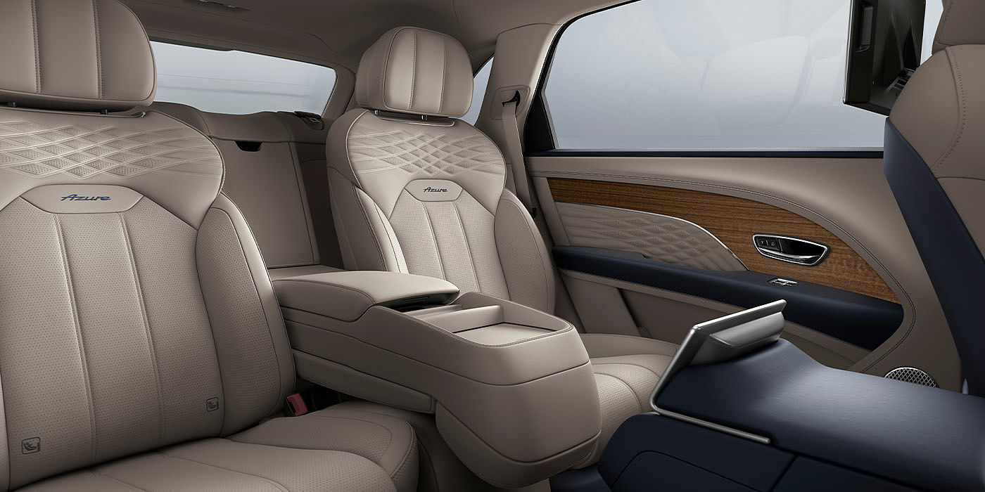 Bentley Jinhua Bentley Bentayga EWB Azure interior view for rear passengers with Portland hide featuring Azure Emblem in Imperial Blue contrast stitch.